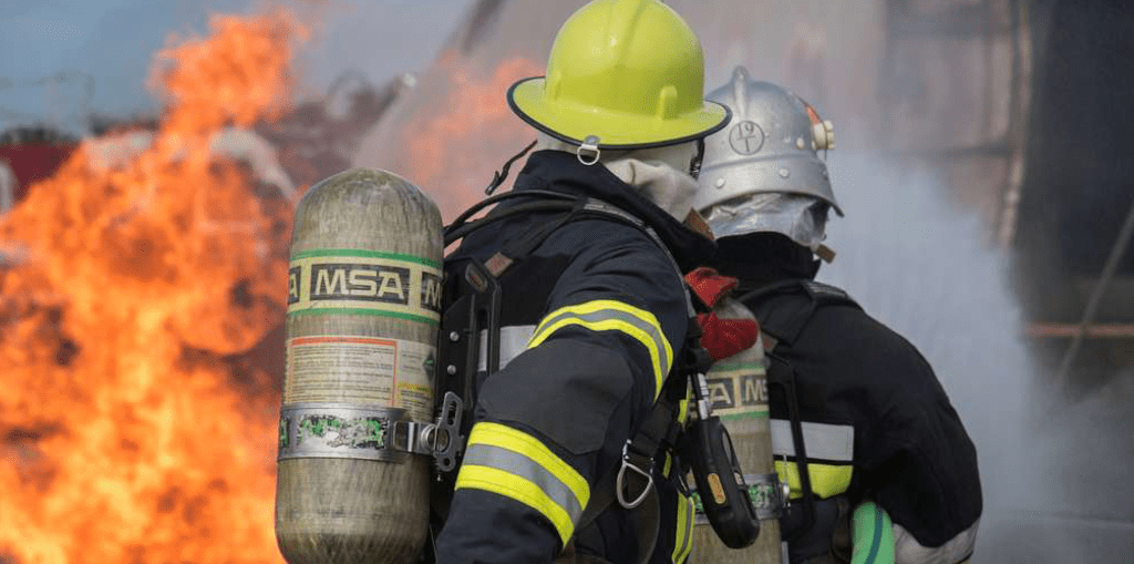 Ukrainian firefighters put out blaze as result of Russian war.