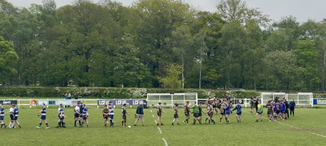 Teams shake hands